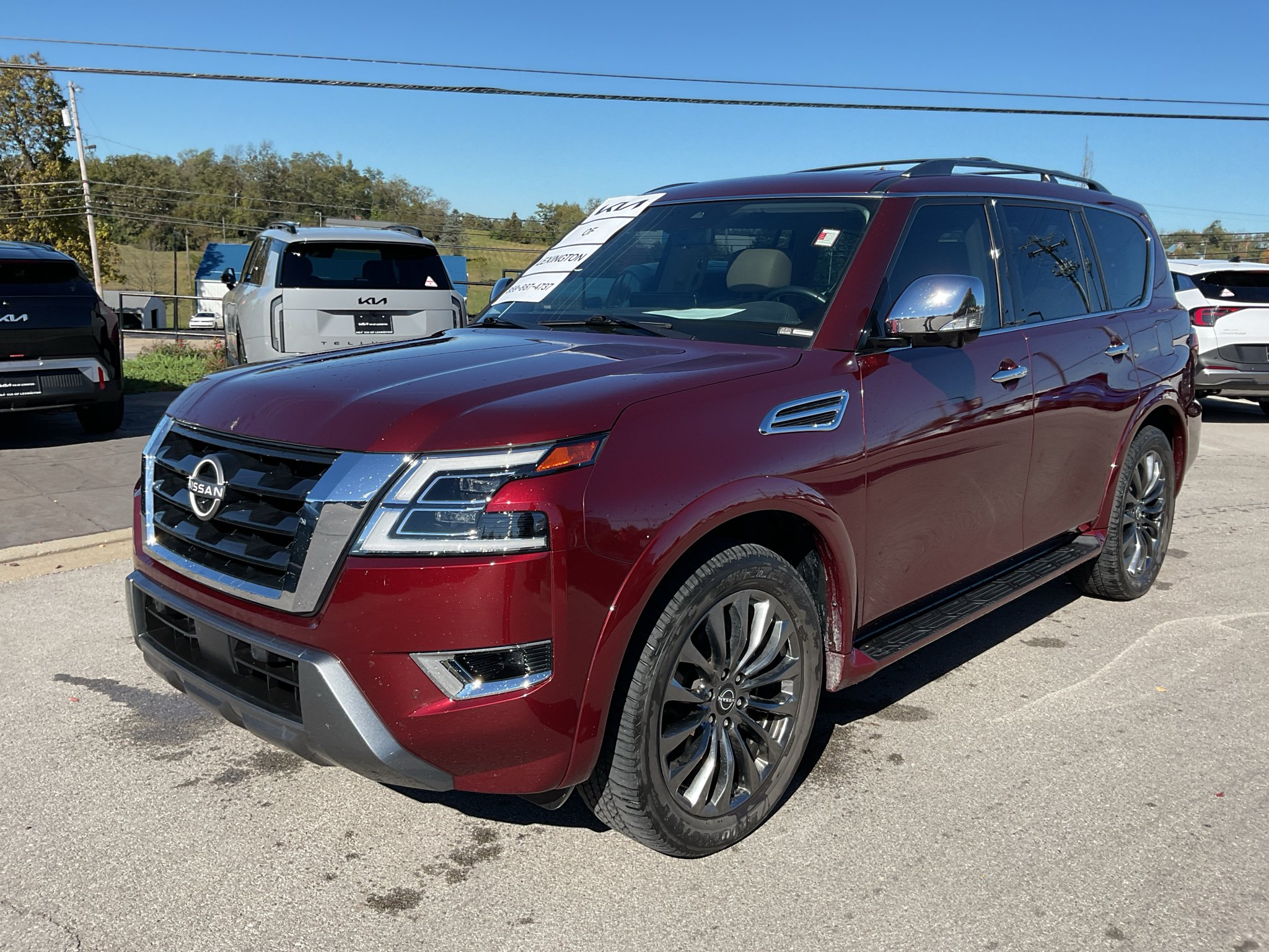 Used 2023 Coulis Red Pearl Nissan Platinum image 4