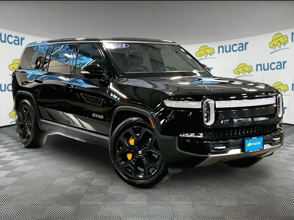 Used 2024 Gray Rivian Adventure image 1