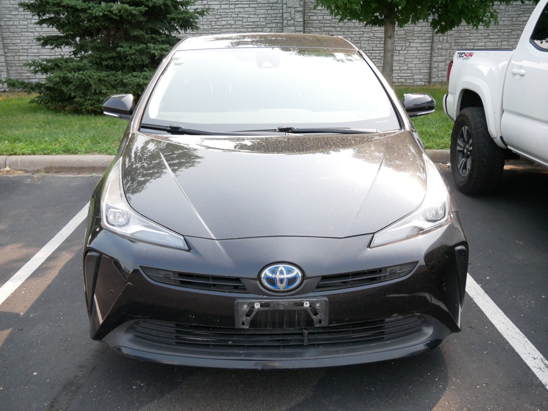 Used 2021 Toyota Prius LE with VIN JTDKAMFU0M3149763 for sale in Brooklyn Center, Minnesota