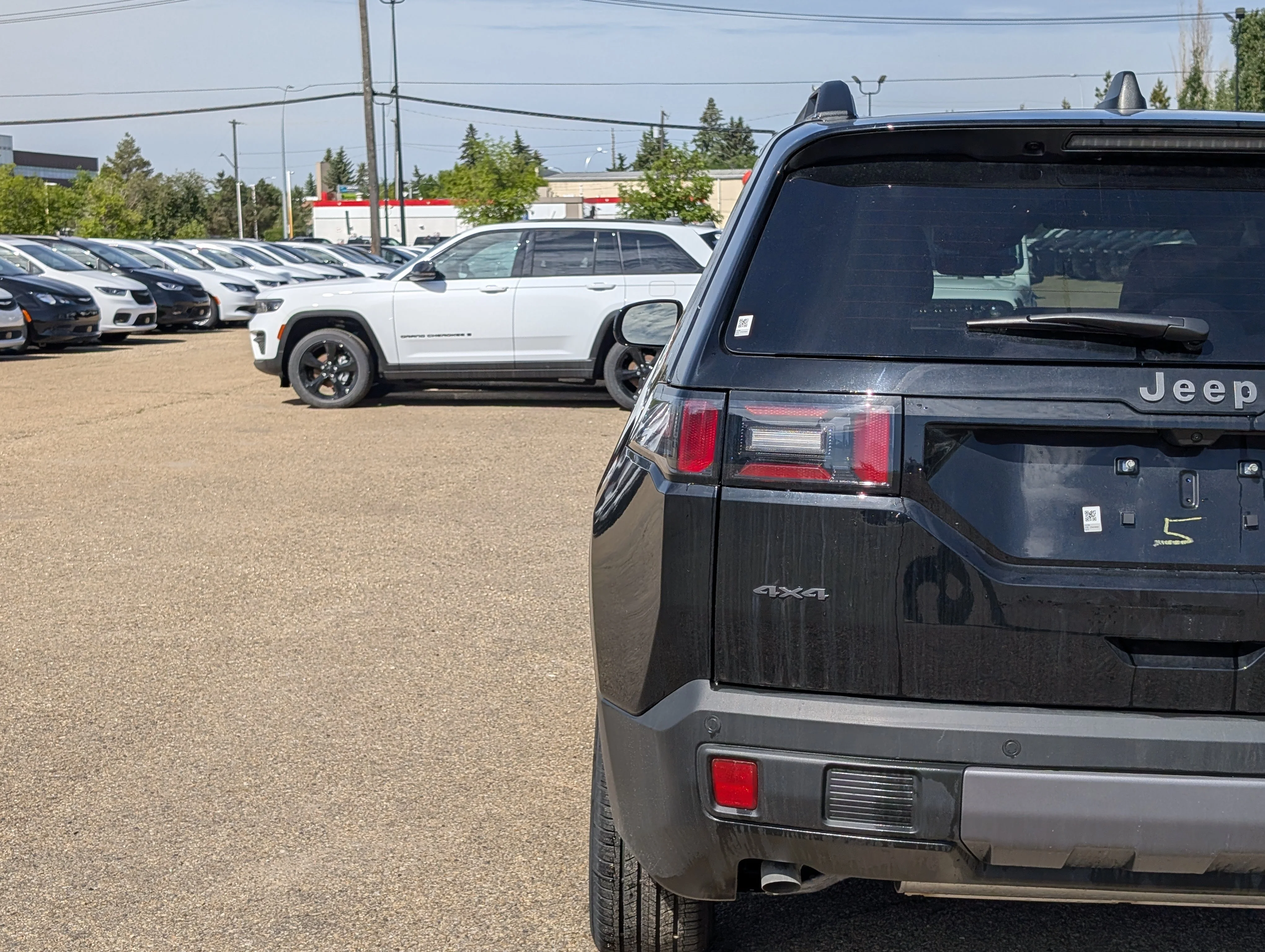 New 2026 Diamond Black Crystal Pearl Jeep Laredo image 13