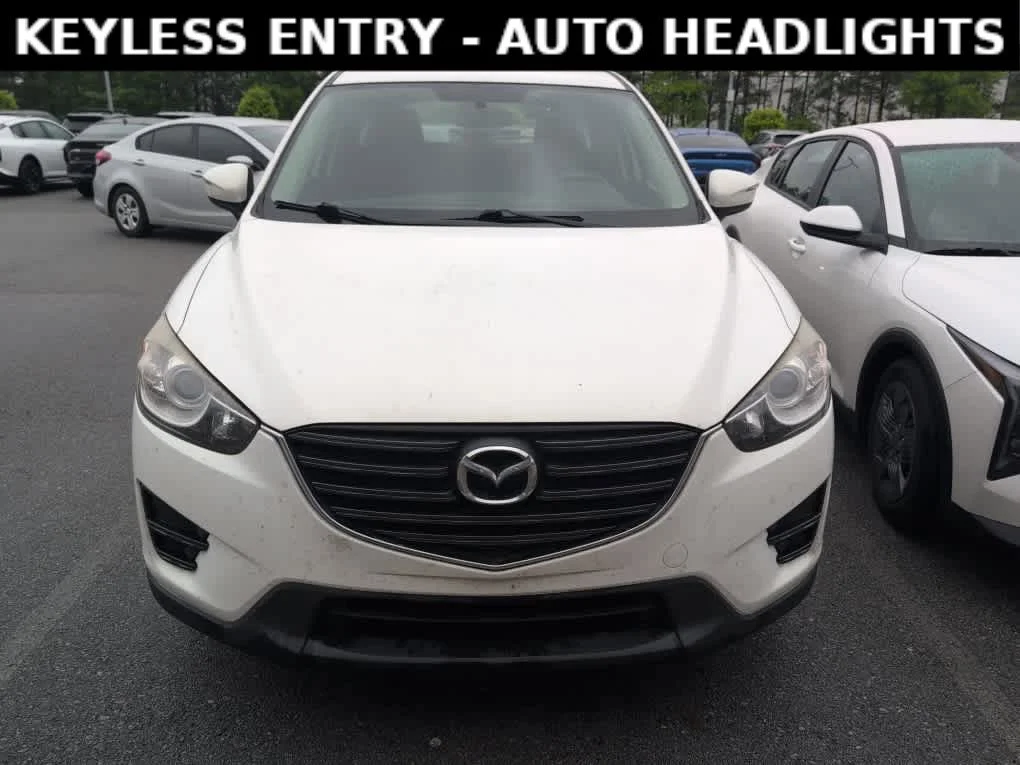 Used 2016 Mazda CX-5 Sport with VIN JM3KE2BY6G0842819 for sale in Little Rock, AR