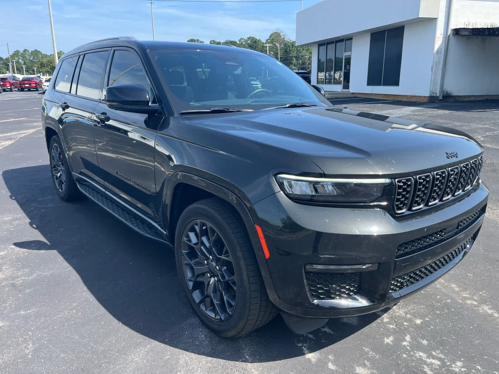 Used 2023 Rocky Mountain Pearlcoat Jeep Summit Reserve image 3