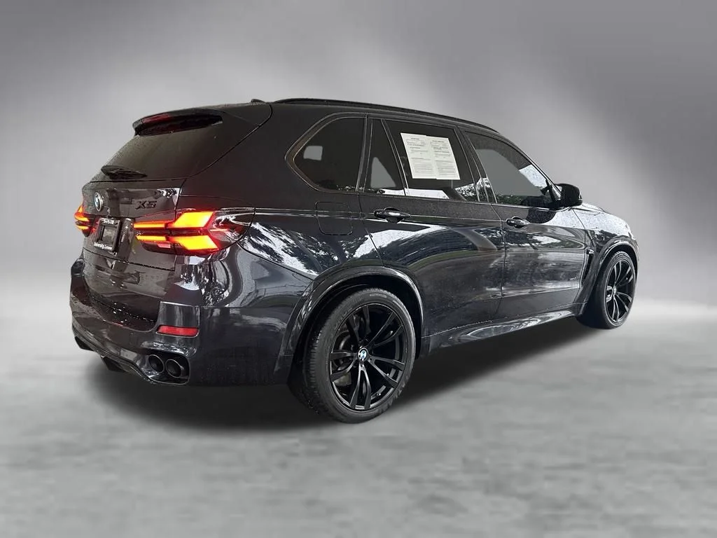 Used 2014 Black BMW xDrive50i image 3