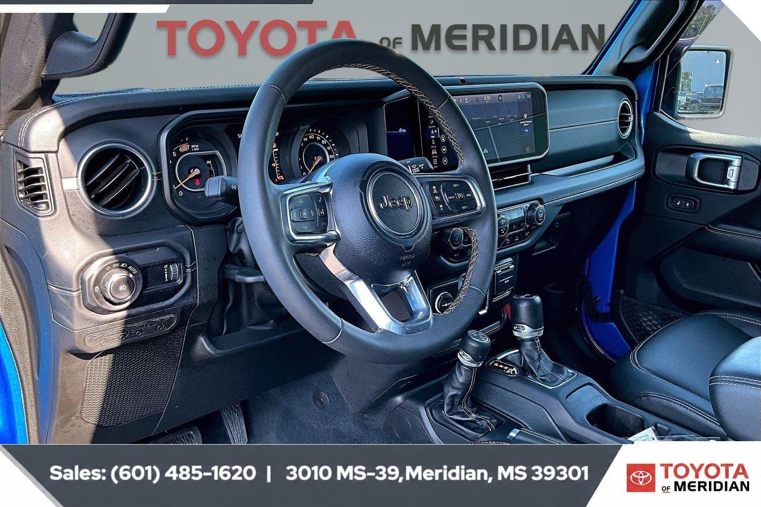 Used 2024 Hydro Blue Pearlcoat Jeep Sahara image 12