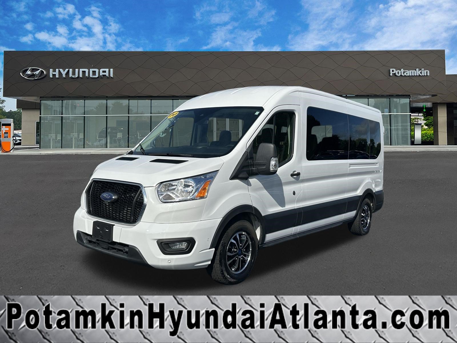 2022 Ford Transit 350 XLT Med Roof Sliding Pass. 148's photo