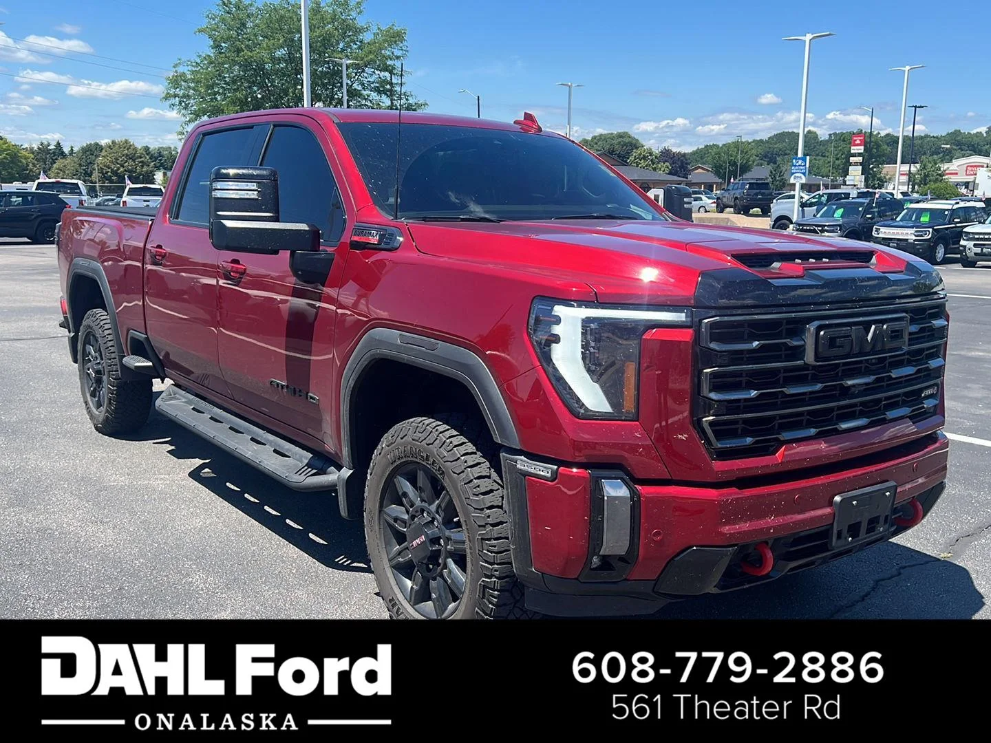 Used 2024 Volcanic Red Tintcoat GMC AT4 image 1