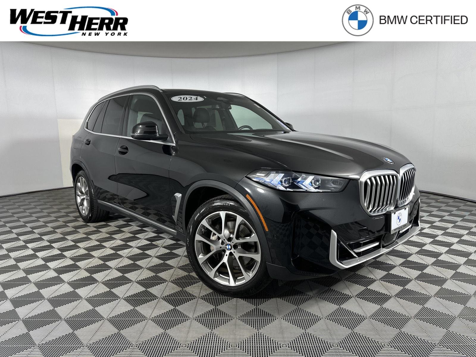 Certified Used 2024 Black Sapphire Metallic BMW xDrive40i image 1