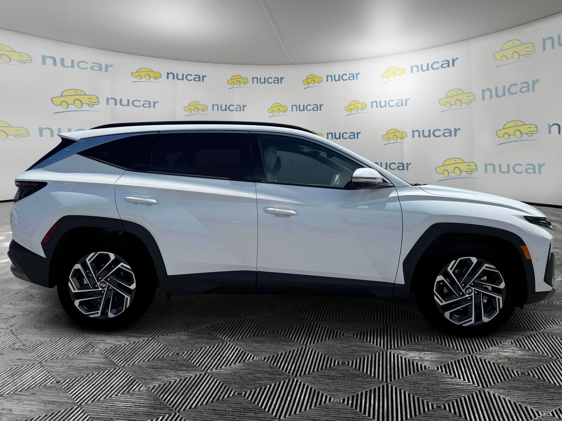 2026 Hyundai Tucson Limited in White at Nucar — photo 9