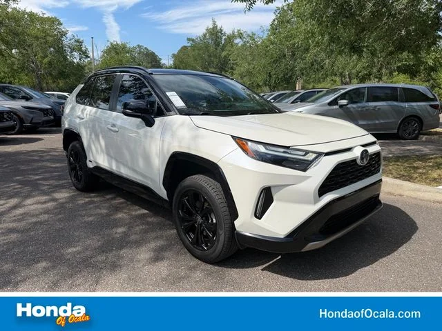 Used 2022 Midnight Black Metallic Toyota XSE image 1