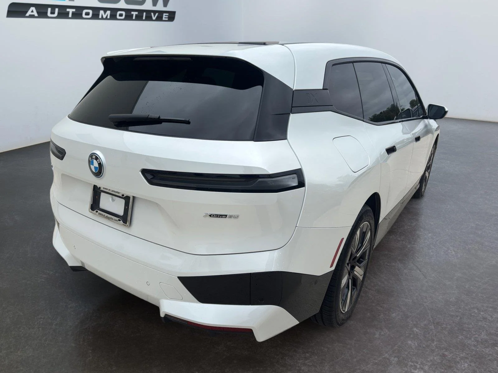 Certified Used 2025 Mineral White Metallic BMW xDrive50 image 13