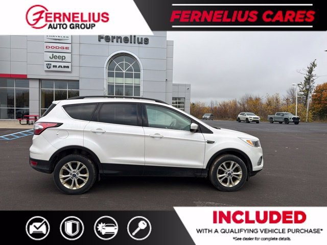 Used 2018 Ford Escape SE with VIN 1FMCU9GD7JUD45403 for sale in Cheboygan, MI