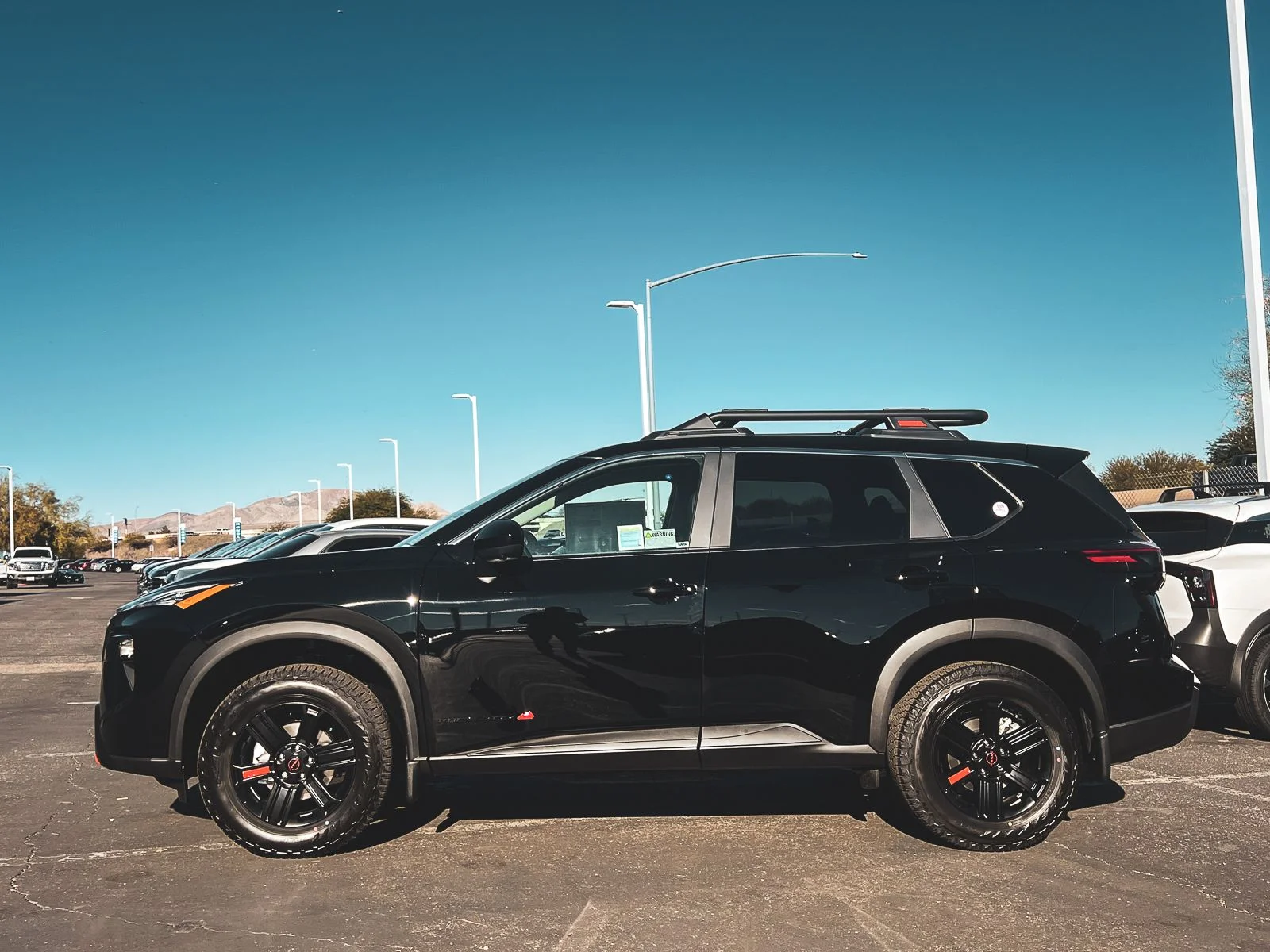 New 2026 Super Black Nissan Rock Creek® image 8