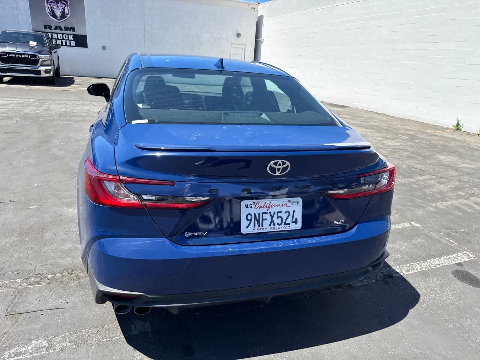 Used 2025 Reservoir Blue Toyota SE image 18