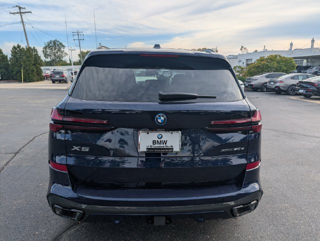 Certified Used 2026 Tanzanite Blue II Metallic BMW xDrive50e image 3