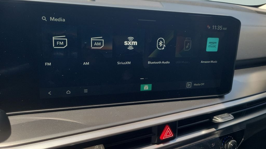 New 2026 Ivory Silver Kia LX image 18