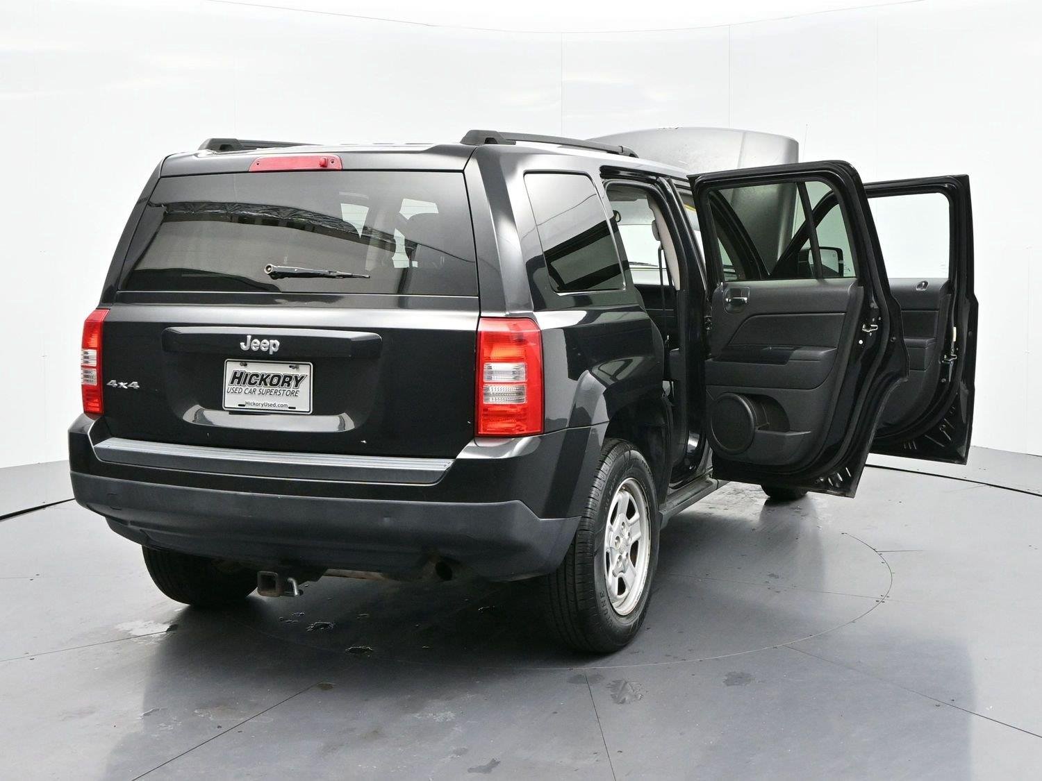 Used 2011 Brilliant Black Crystal Pearl Jeep Sport image 32
