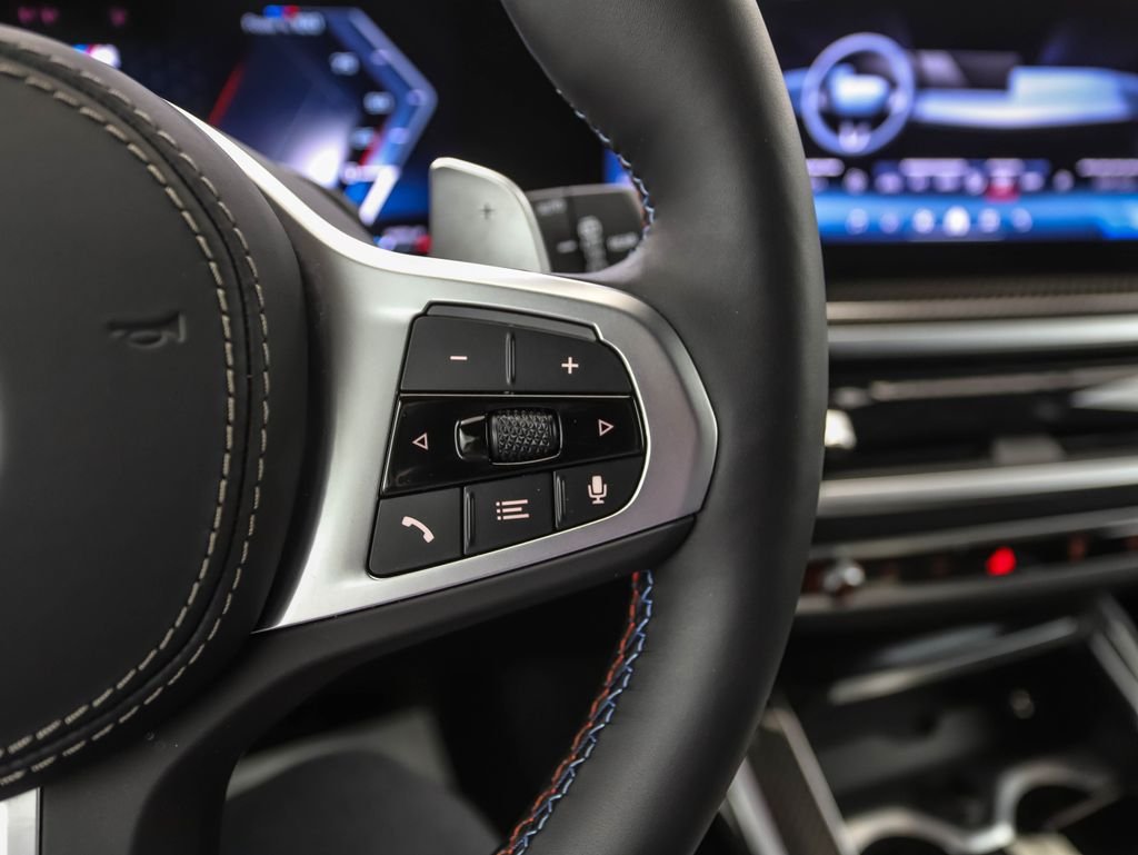 Used 2026 Black Sapphire Metallic BMW M60i image 13