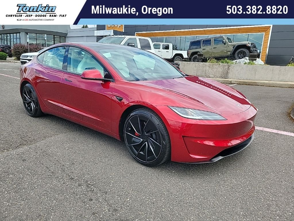 Used 2025 Red Tesla Performance image 1