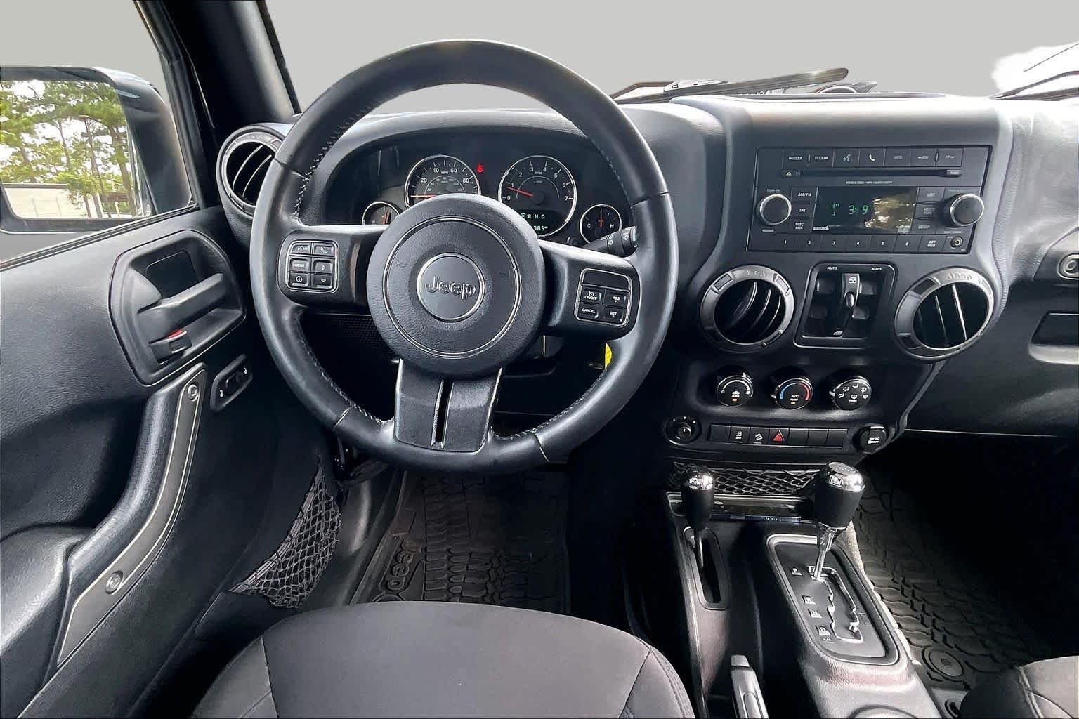 Used 2016 Black Clearcoat Jeep Sport image 6