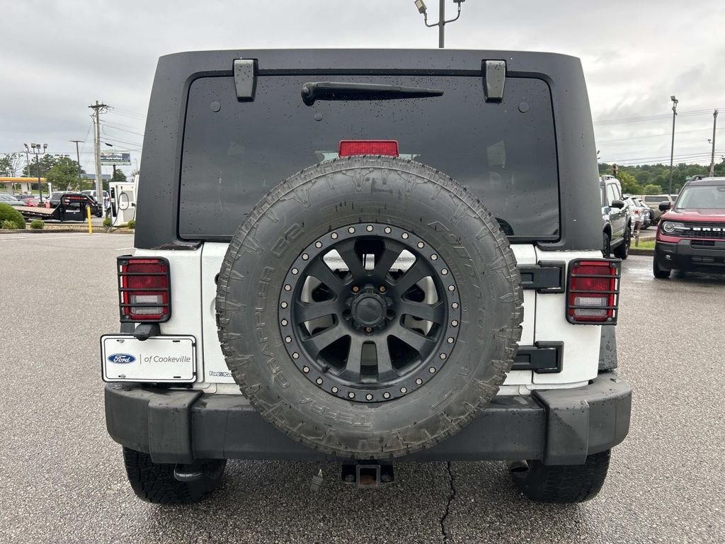 Used 2012 Bright White Jeep Unlimited Sport image 5