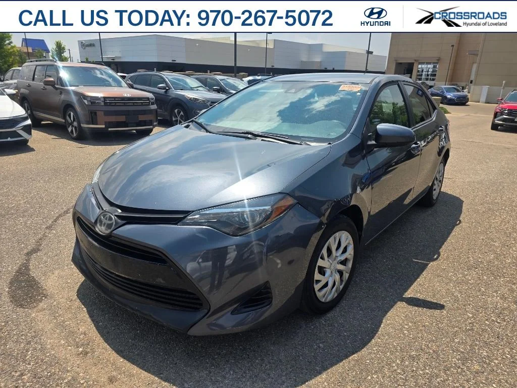 Used 2019 Slate Metallic Toyota LE image 1