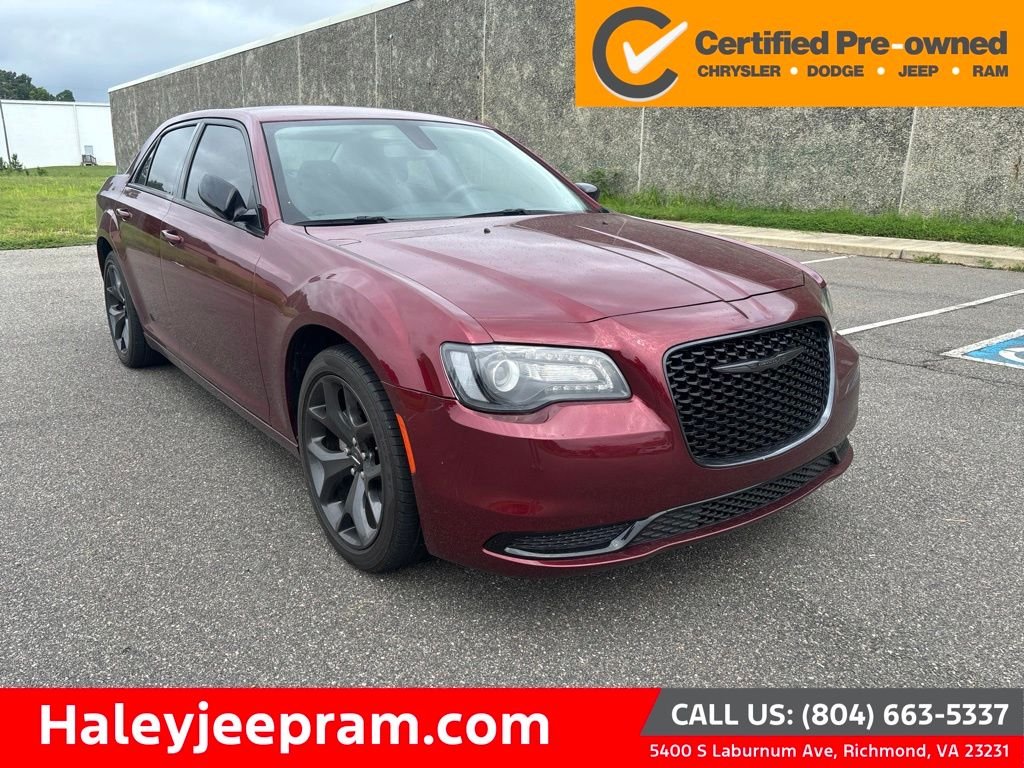 Used 2023 Red Chrysler Touring image 1