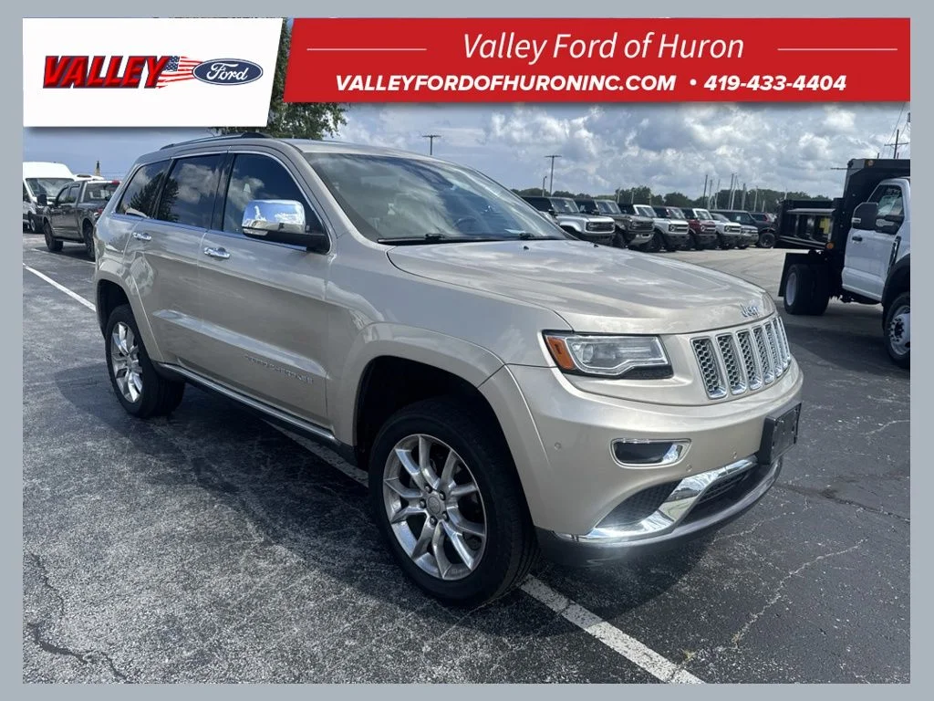 Used 2014 Beige Jeep Summit image 1
