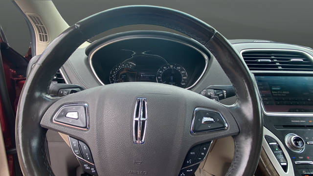 Used 2016 Ruby Red Metallic Lincoln Reserve image 16