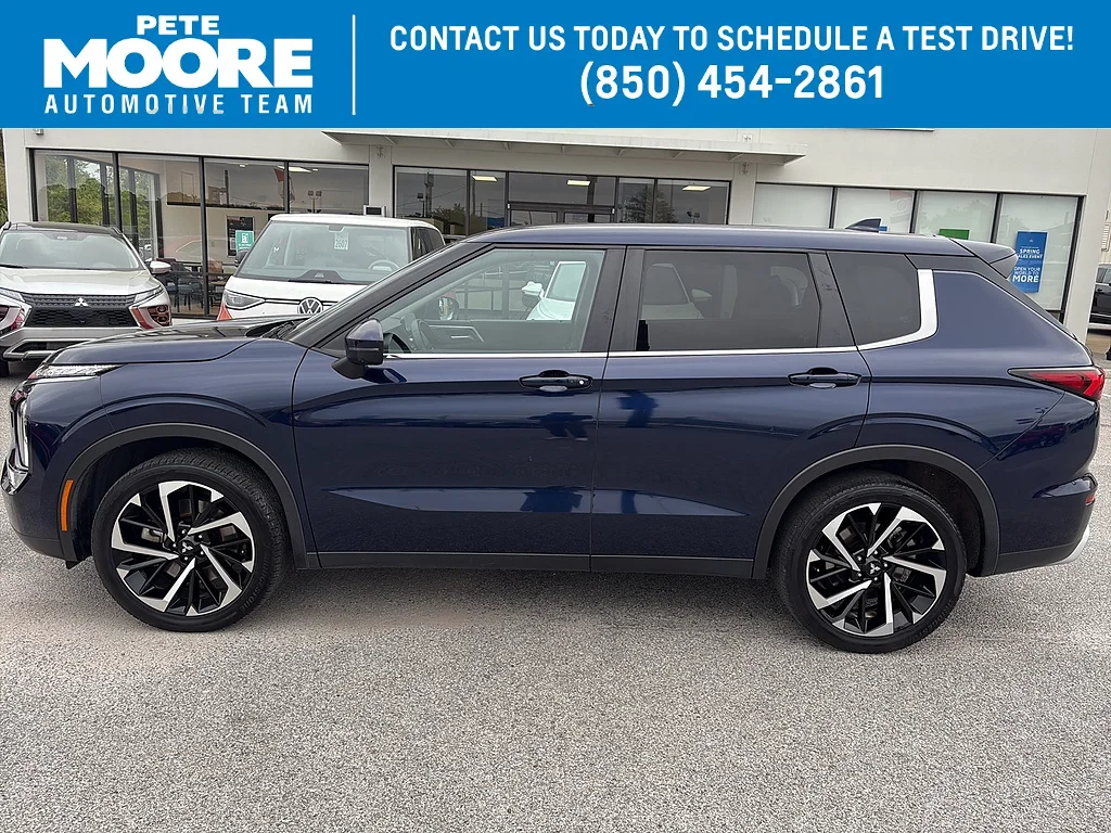 Used 2024 Cosmic Blue Metallic Mitsubishi  image 1