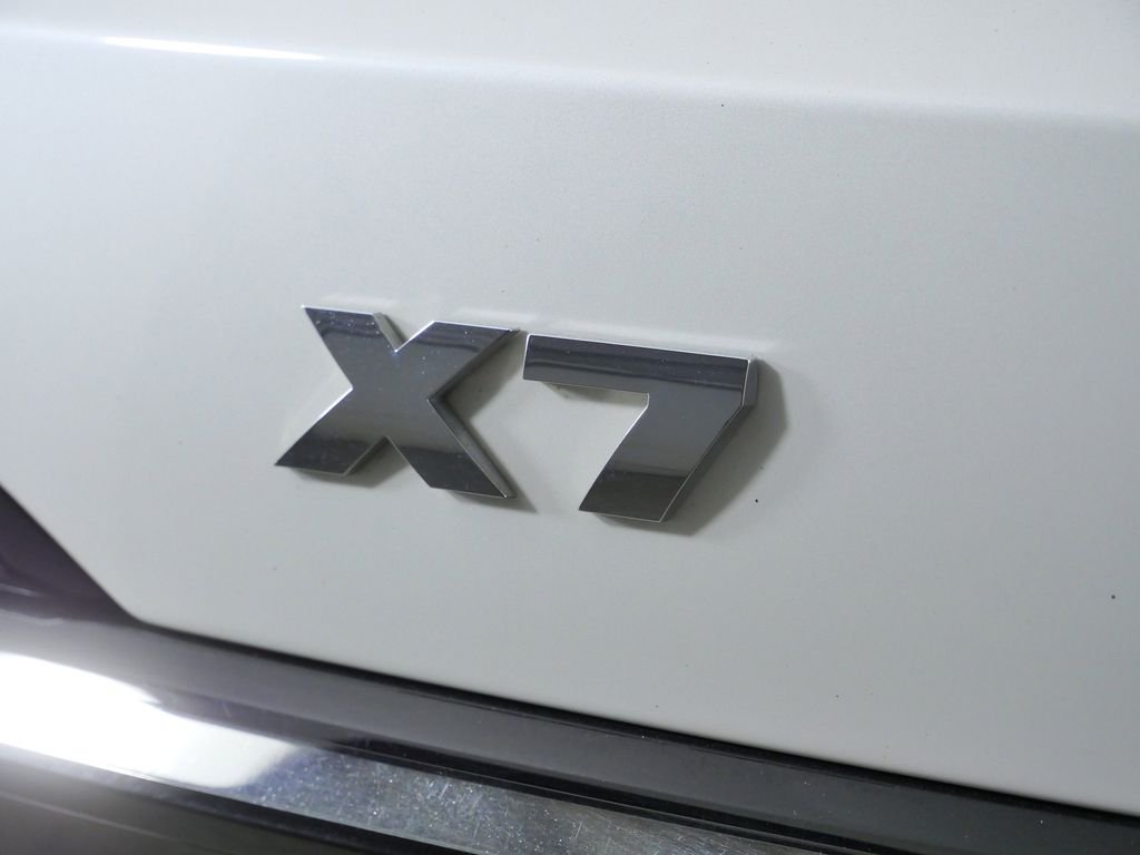 Certified Used 2024 Mineral White Metallic BMW M60i image 16