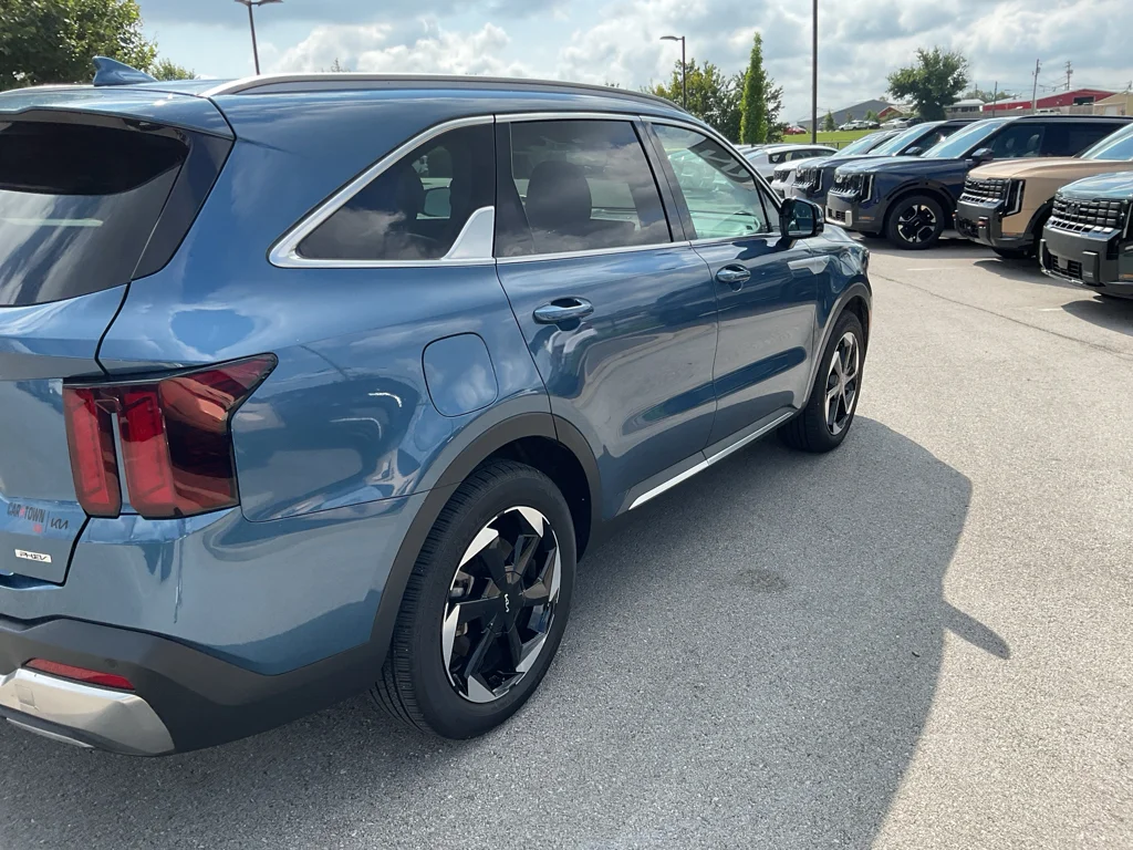 Used 2025 Mineral Blue Kia EX image 4