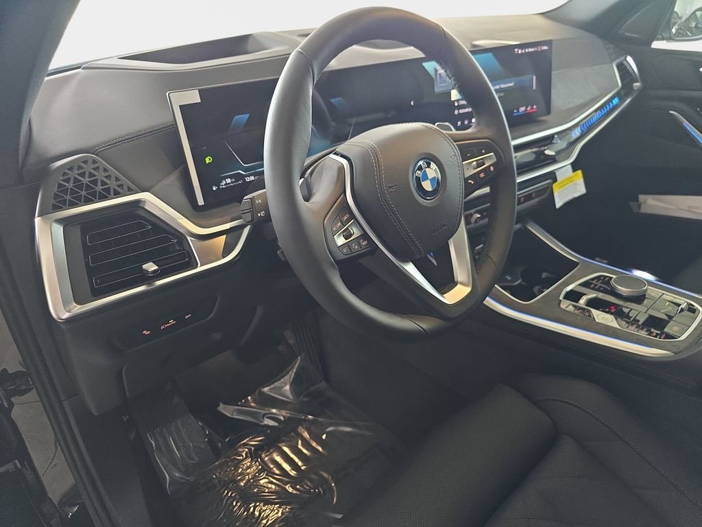 New 2026 Black Sapphire Metallic BMW xDrive50e image 13