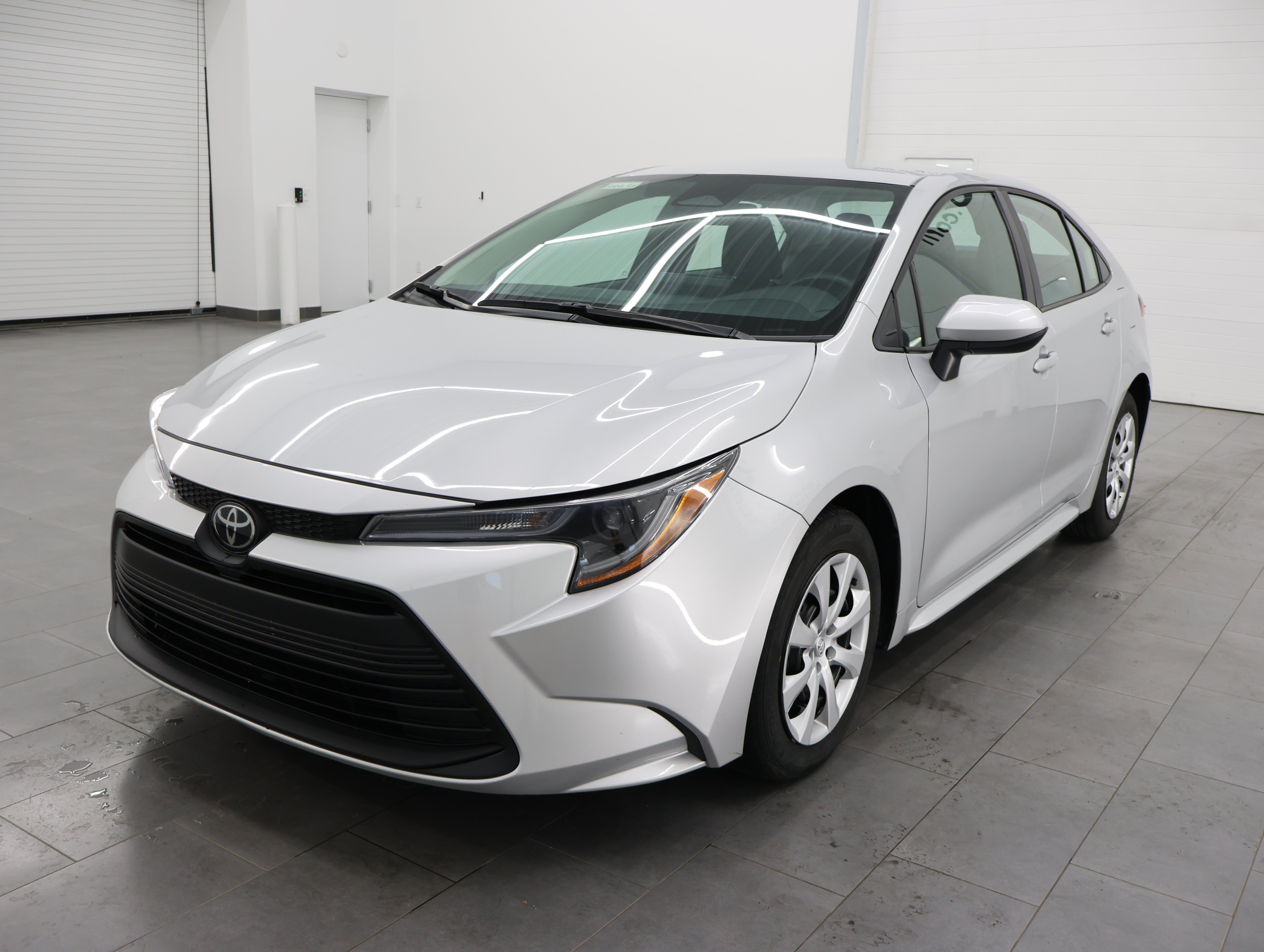 Used 2024 Classic Silver Metallic Toyota LE: LE-FOUR DOOR-FWD-ADAPTIVE CRUISE-BACKUP CAM-NEW TIRES image 6