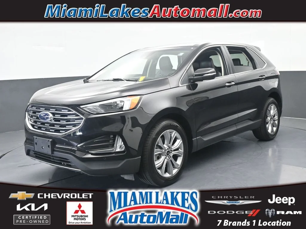 Used 2024 Black Metallic Ford Titanium image 1
