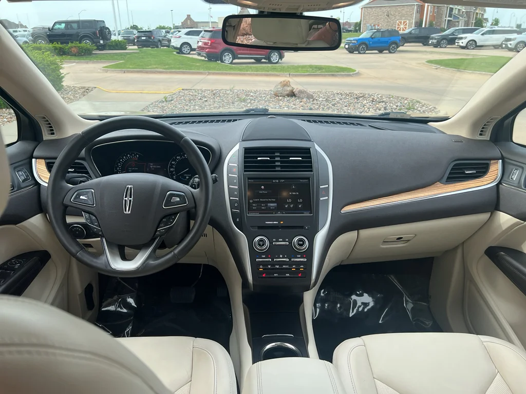 Used 2015 Lincoln MKC Base with VIN 5LMCJ1A97FUJ14648 for sale in Pella, IA