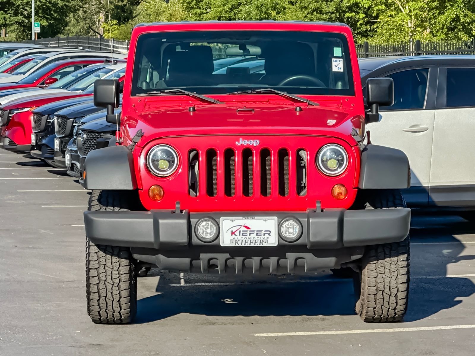 Used 2012 Red Jeep Sport image 9