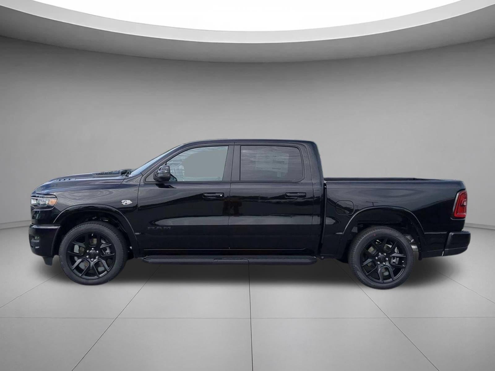 New 2026 Diamond Black Crystal Pearl-Coat Exterior Paint RAM Laramie image 2