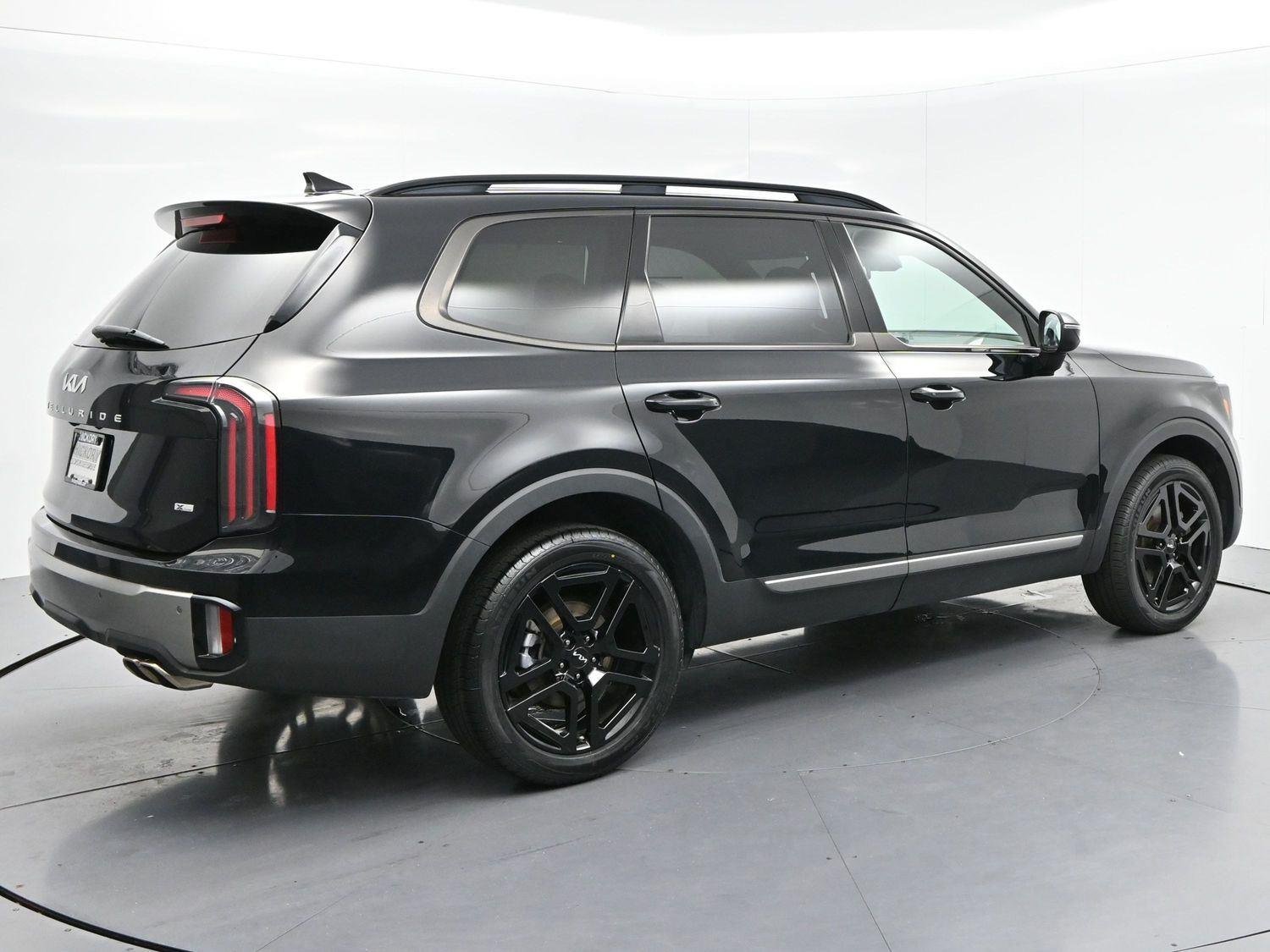 Used 2023 Ebony Black Kia EX X-Line image 7