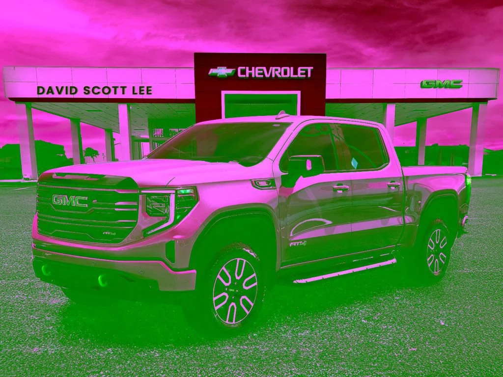 Used 2025 Sterling Metallic GMC AT4 image 1