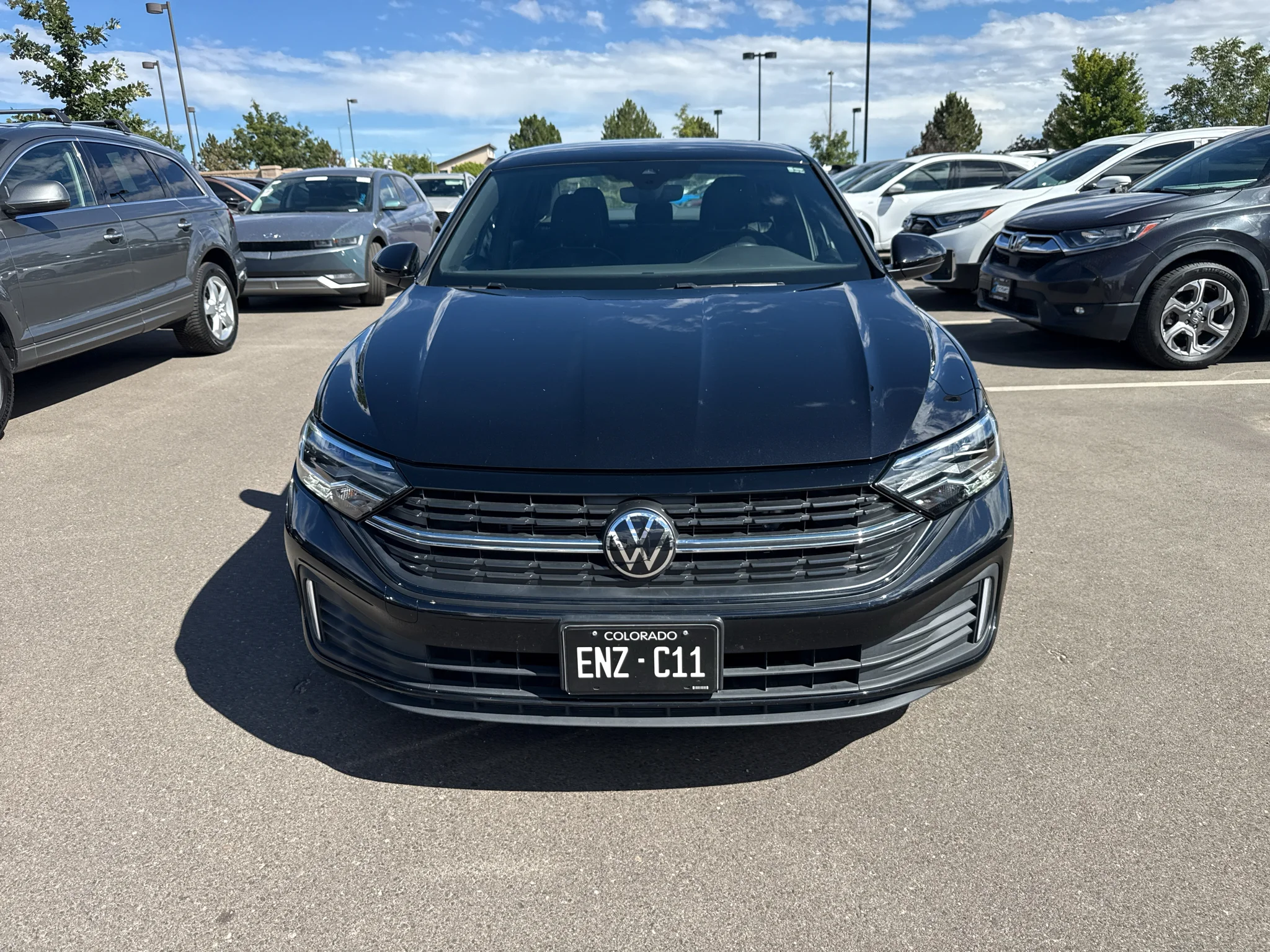 Used 2024 Deep Black Pearl Volkswagen Sport image 1