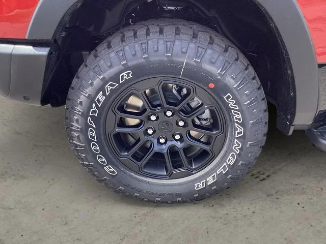 New 2026 Molten Red Ram REBEL CREW CAB 4X4 5