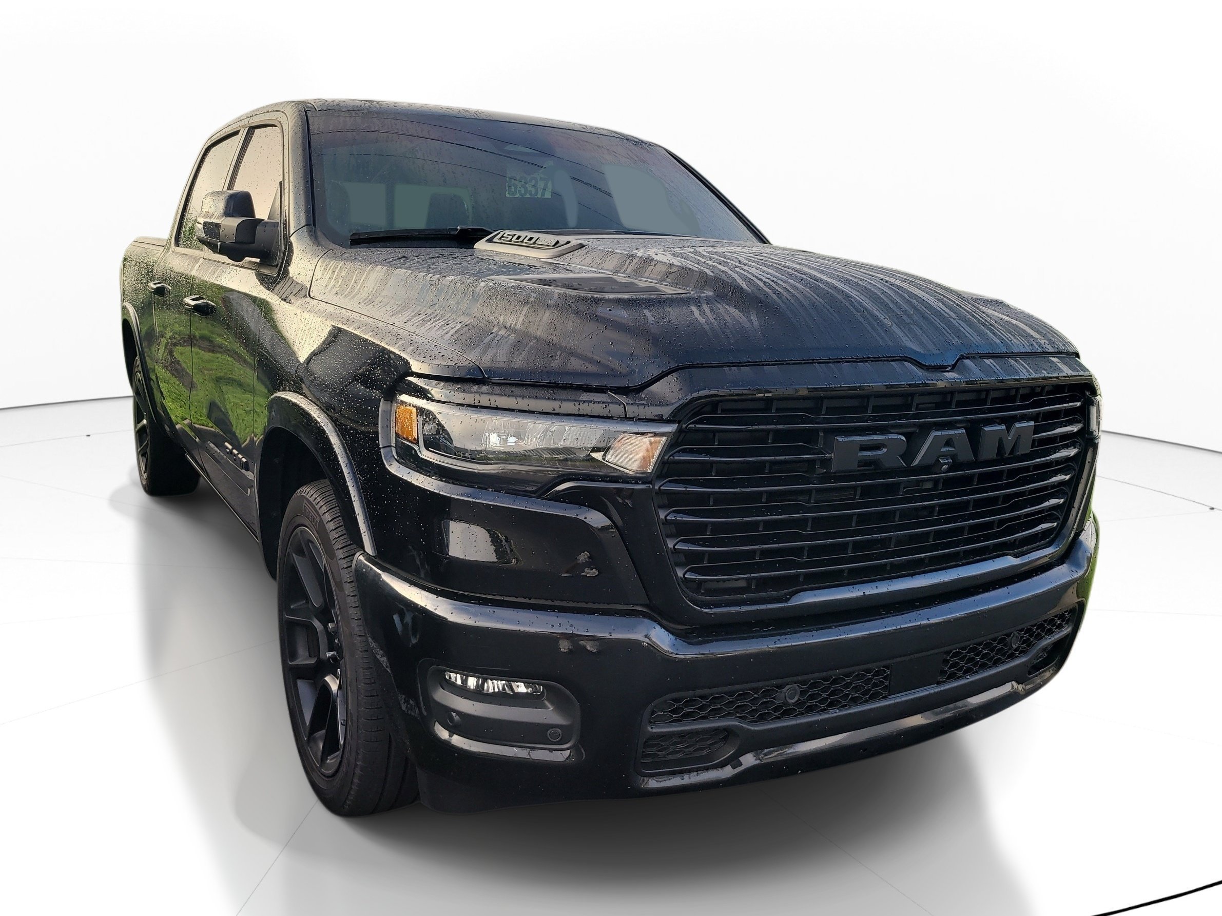 Used 2025 Diamond Black Crystal Pearlcoat Ram Laramie image 1