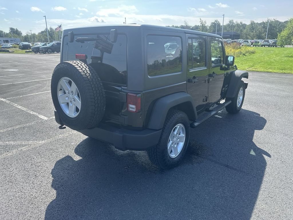 Used 2014 Black Jeep Unlimited Sport image 8