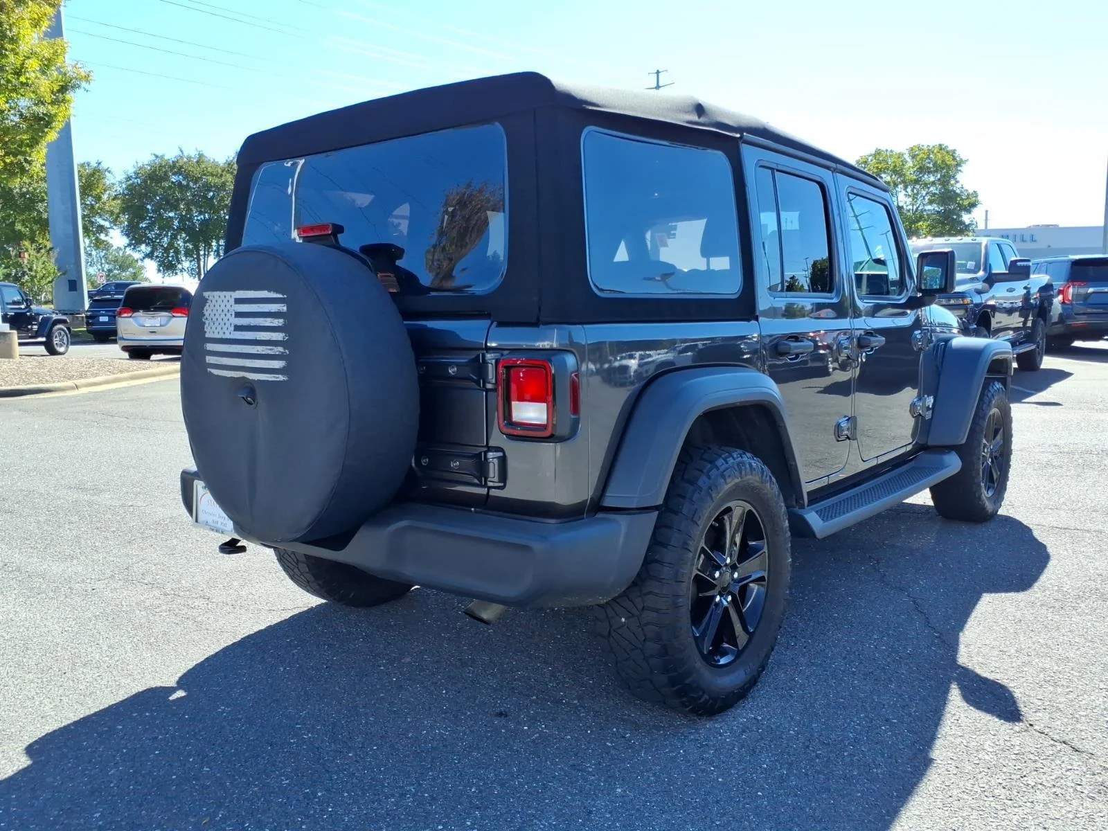 Used 2020 Granite Crystal Metallic Clearcoat Jeep Sport S image 2