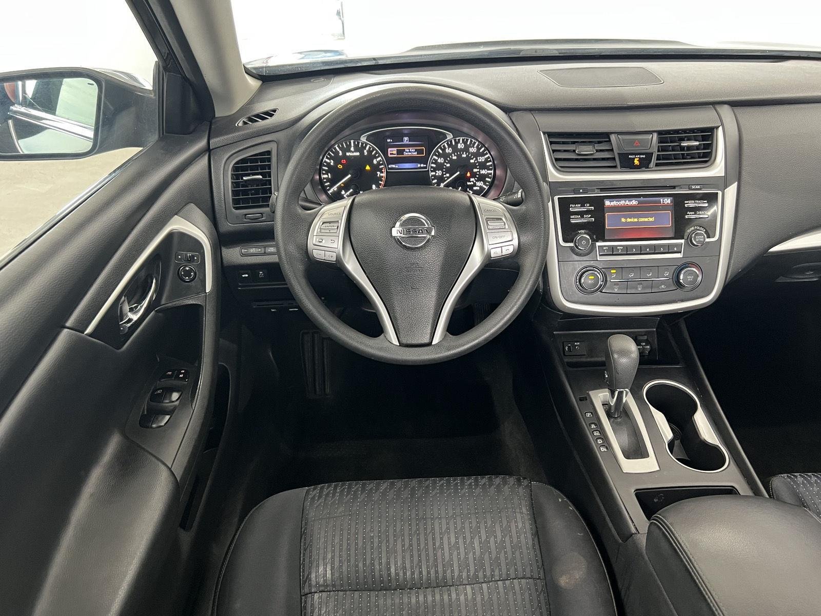 Used 2016 Super Black Nissan 2.5 S image 26
