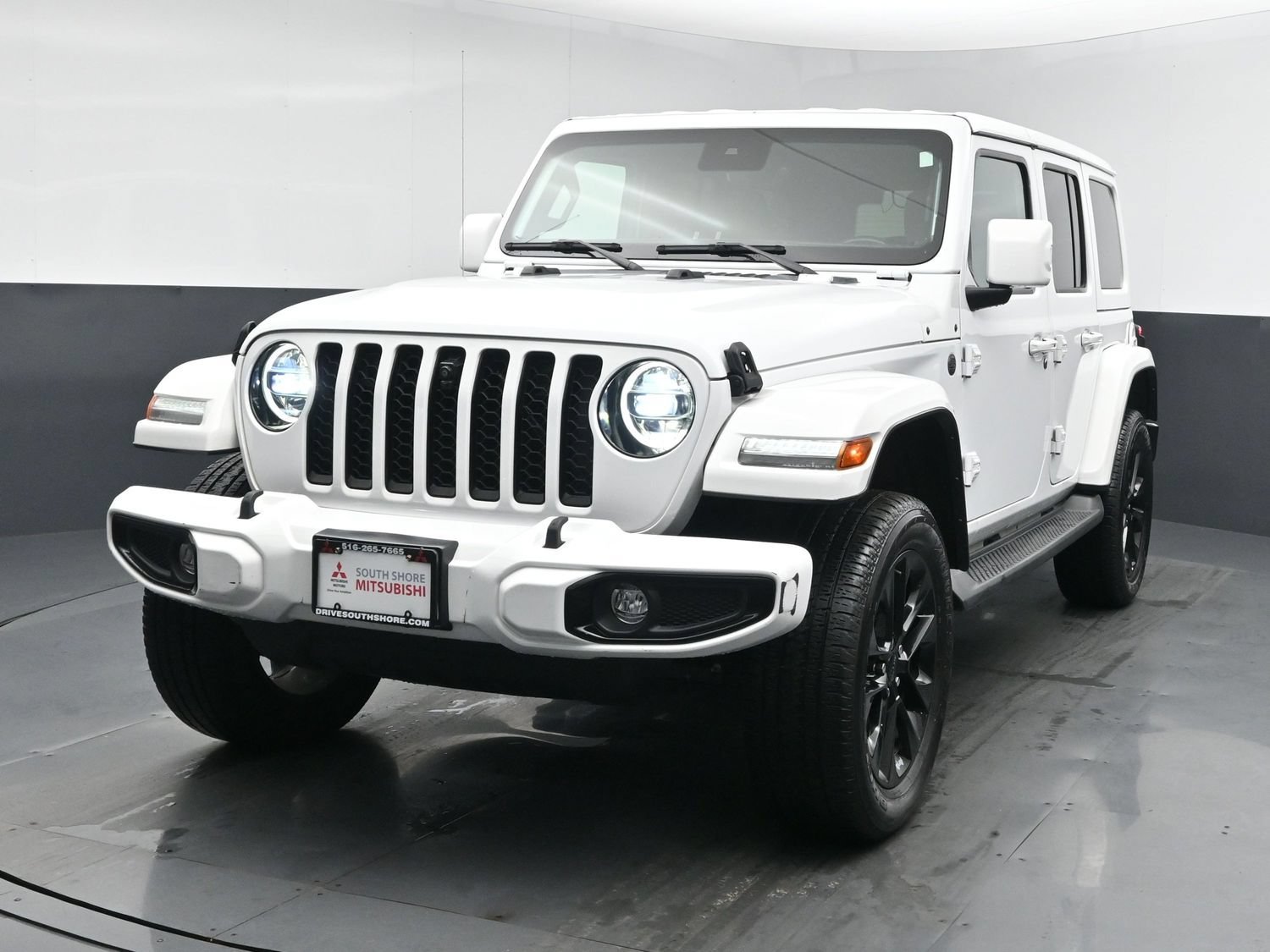Used 2022 Bright White Clearcoat Jeep Unlimited High Altitude image 1