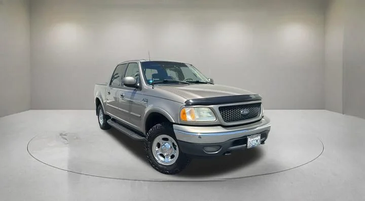 Used 2001 Beige Ford Lariat image 1