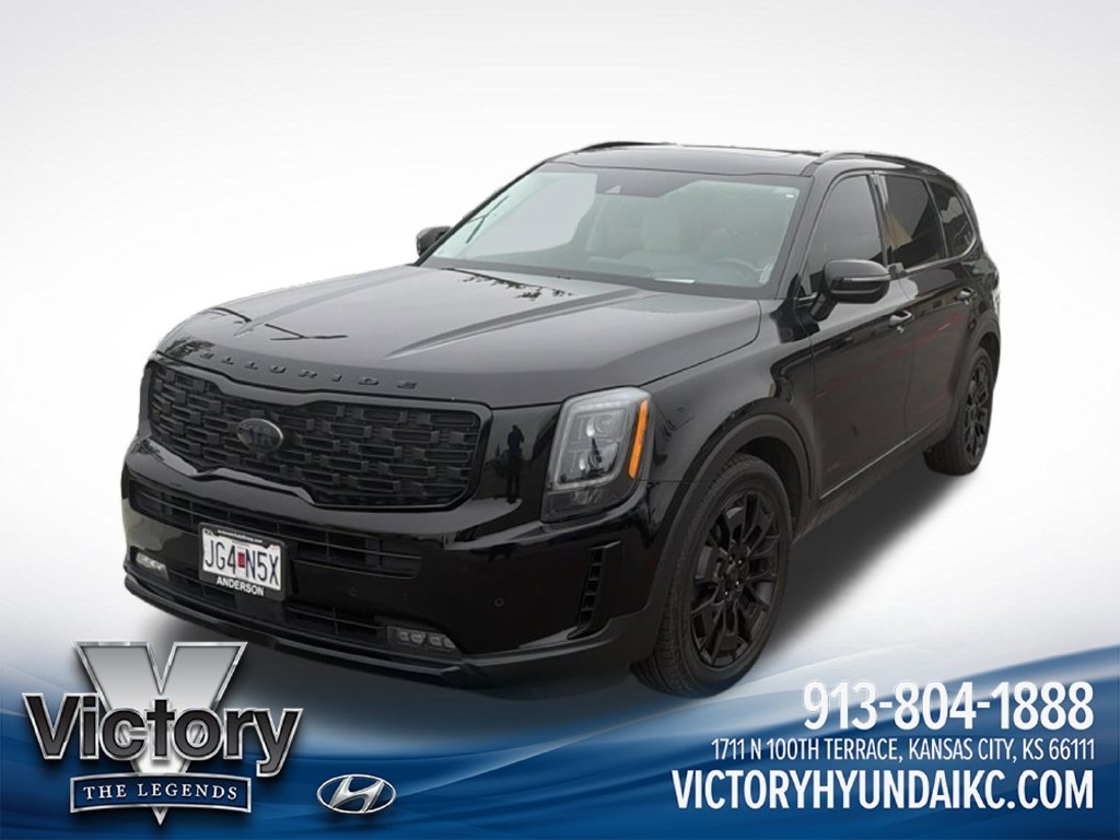 Used 2021 Black Kia SX image 1