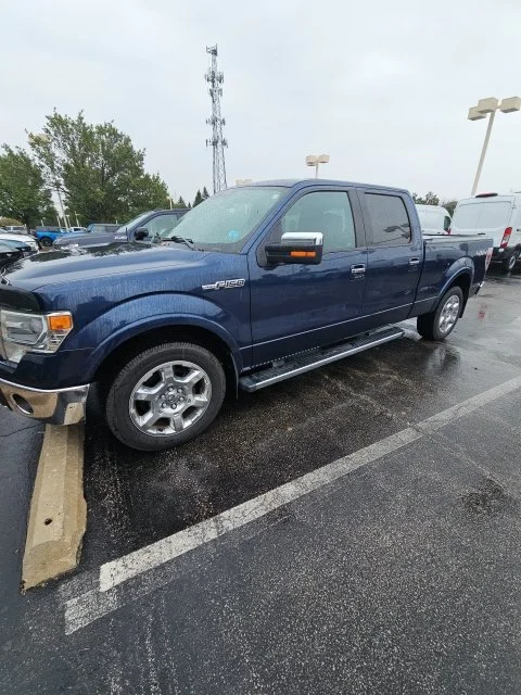 Used 2014 Blue Jeans Metallic Ford Lariat image 1