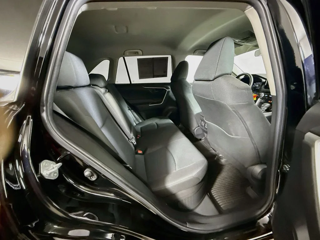 Used 2023 Midnight Black Metallic Toyota Hybrid LE image 25